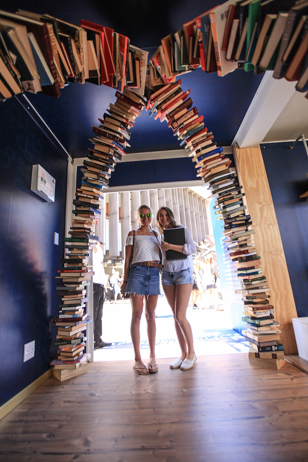 Thirst & Know Bar entrance book arch