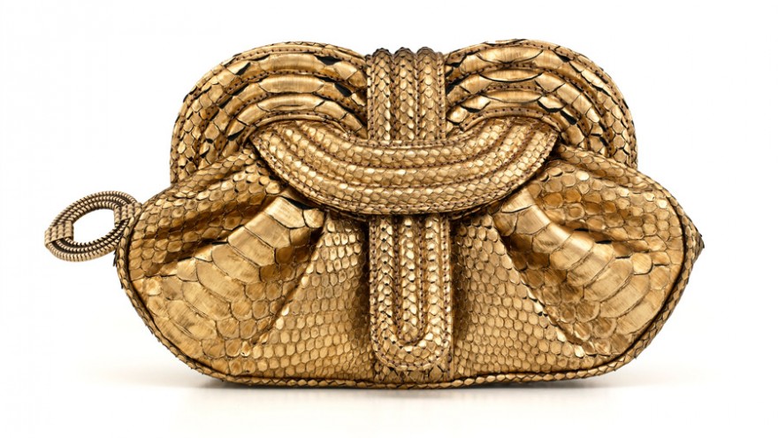 Eclipse Clutch in gold python by Lara Bohinc. 