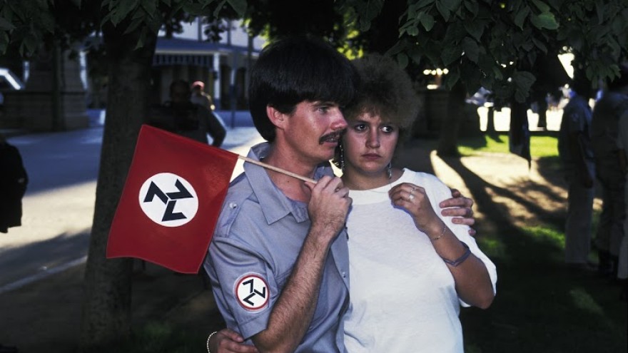 Graeme Williams, Member of the ultra-right-wing AWB attends a rally with his girlfriend, Pretoria, 1991. Courtesy the artist. © Graeme Williams.
