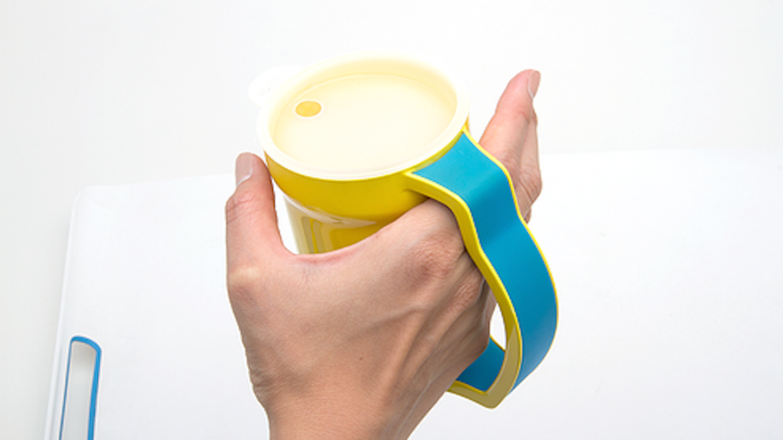 Another cup has a handle that extends to the tabletop for added support.