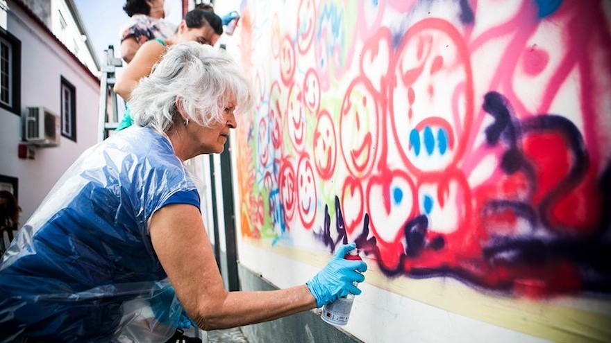 Urban Art Workshops for Seniors is a programme that is putting spray cans in the hands of Lisbon's pensioners, who are now part of a group called Lata 65. Photo credit Rui Soares