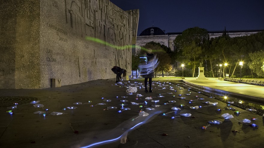 The anonymous group sets up their display at Colombus Square