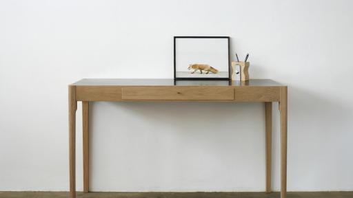 Brass top, tapered leg dressing table by James Mudge. 