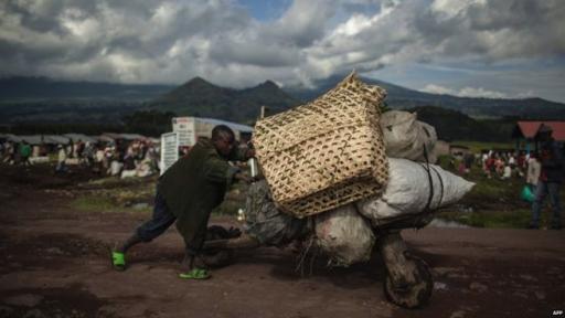 In eastern Congo, hand-hewn, low-tech scooters called chukudu's are a used to carry heaps of cargo, from food to fuel to bricks, across long distances. Image:mzaztiz.blogspot