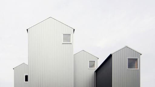 Standing at different heights, these steel-clad towers form one playful residence in Japan’s city of Kosai.