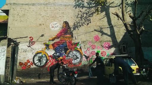 In Rawalpindi, the collective painted Bubbli Mallik, a Khwaja-sira (transgender person) riding a motorcycle. 