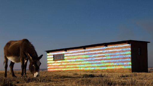 South African-based artist r1 used 1000 recycled CDs to clad an abandoned farmhouse in Randfontein, a mining city in western Gauteng. 