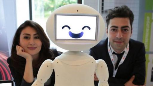 LuxAI's robot with Aida Nazariklorram, co-founder and Chief Medical Officer, and Dr. Pouyan Ziafati, founder and CEO