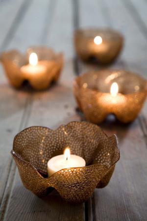 Candle holders made from brown plastic bottles. Candle holders made from brown plastic bottles.