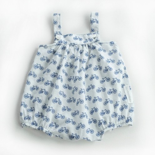 Navy bikes on white cotton baby dungaree from Tic Tac Toe. 