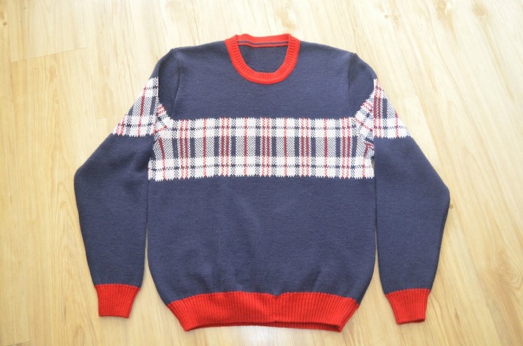 Nostalgia sweater by Dennis Chuene. 