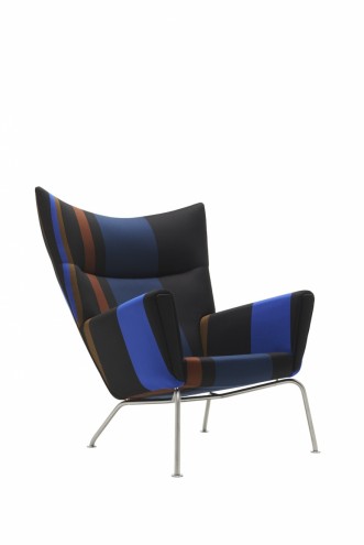 Paul Smith redesigns Carl Hansen & Son's iconic Shell Chair in collaboration with Maharam. 