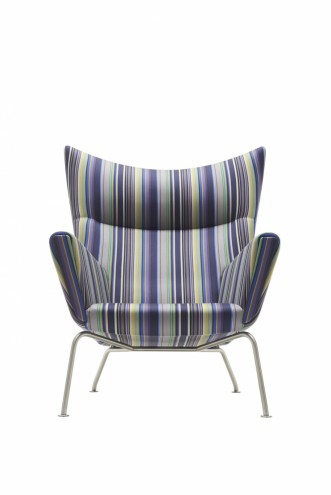 Paul Smith redesigns Carl Hansen & Son's iconic Shell Chair in collaboration with Maharam. 