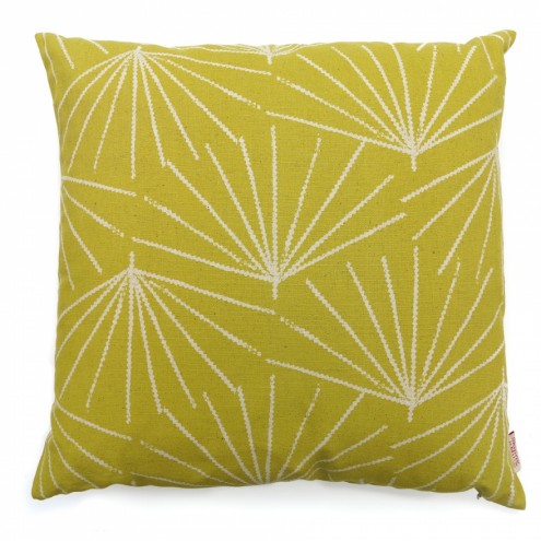 A cushion covered in Palmetto from Skinny laMinx's new Paradise is Here collection. 