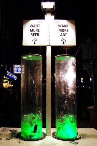 Fesitval-goers vote with their waste on a Wecup installation.