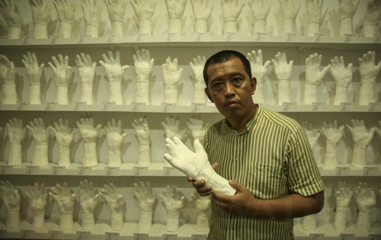 Htein Lin immortalises 1000 of Myanmar’s political prisoners. Image: Irrawaaddy.org