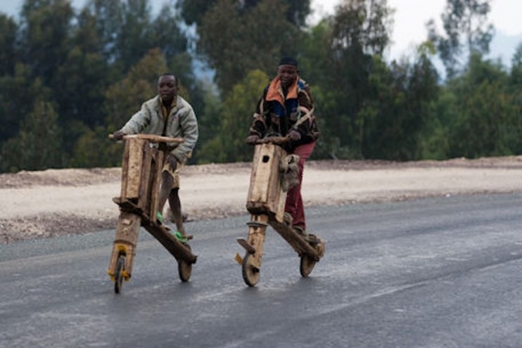 In eastern Congo, hand-hewn, low-tech scooters called chukudu's are a used to carry heaps of cargo, from food to fuel to bricks, across long distances. Image: Todd Lawson