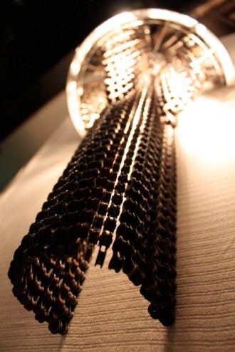 Recycled bicycle chain chanderlier by Carolina Fontoura Alzaga. 