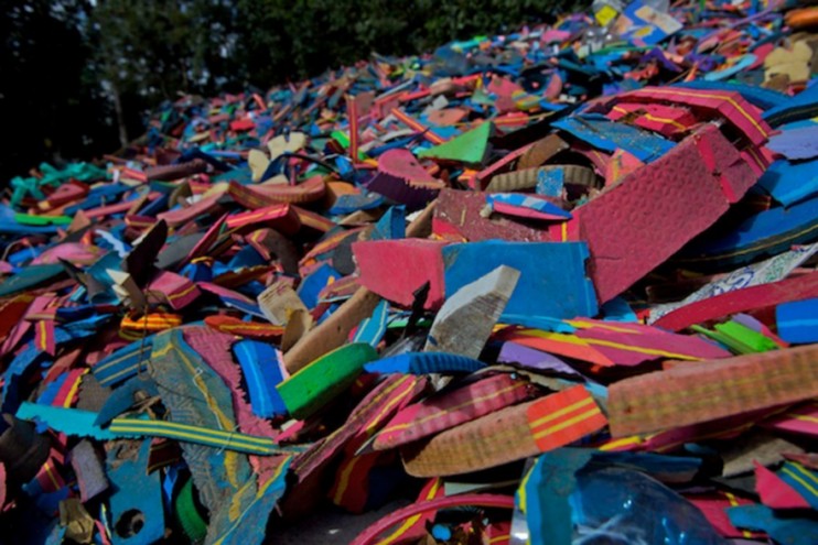 A mound of plastic on the beach. 