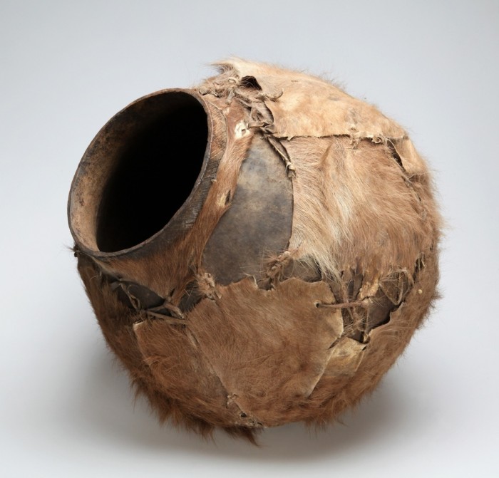 Water or beer African pot, covered with skin, from the Iziko Social History Collection.