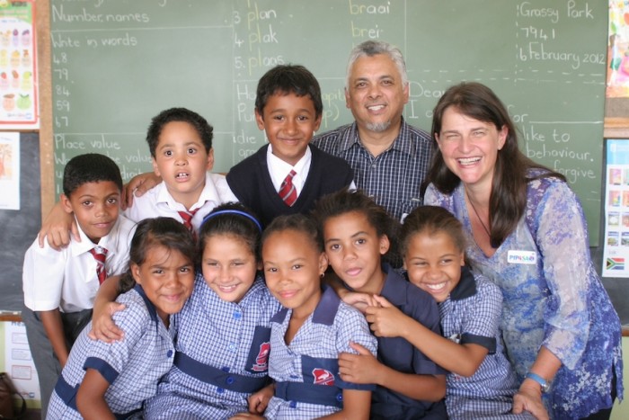 Ridwan Samodien and Louise van Rhyn with Kannemeyer Primary School learners.