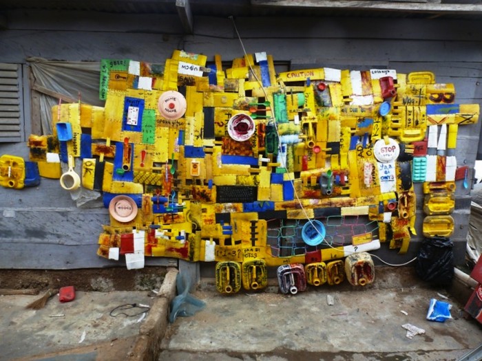 Serge Attukwei Clottey turns yellow oil gallons, a symbol of scarcity in Ghana’s into political art. 