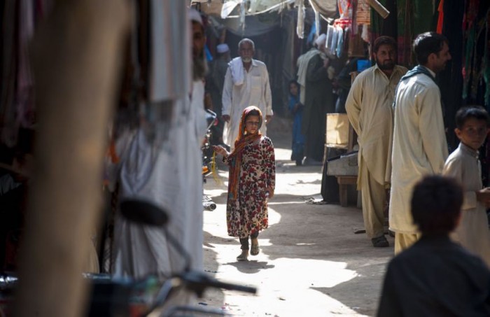 The bustling market place is the centre of the community in the Kot Chandana refugee village. Image: UNHCR Photo galleries