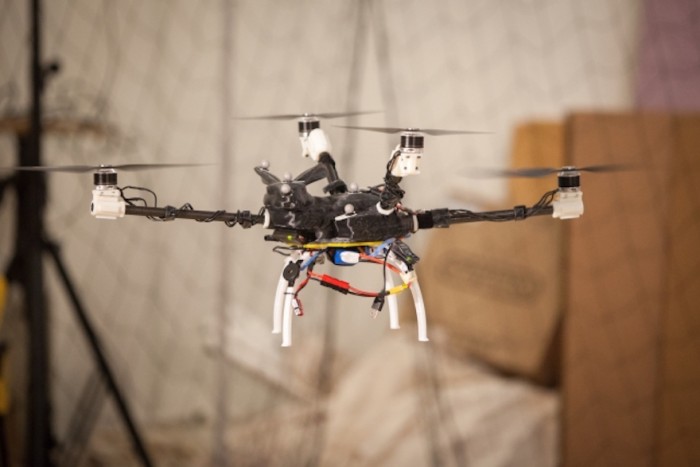A four-rotor "bunnycopter" developed at MIT's Computer Science and Artificial Intelligence Laboratory features propellers at different heights.  Photo: Jason Dorfman/MIT CSAIL