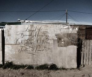 'a letter to the city of cape town from blikkiesdorp  - land, bread, housing, education, clothing, justice, peace.' by Faith47