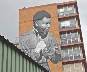 Freddy Sam's Madiba mural from the original photo by Bob Gosani © BAHA foundation. 