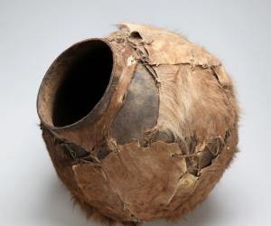 Water or beer African pot, covered with skin, from the Iziko Social History Collection.
