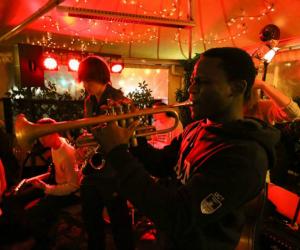 Jo Lanre Kunnuji on the trumpet at a performance. 