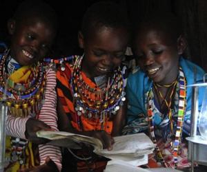 Children reading by Evans Wadongo's Mwangabora light. 