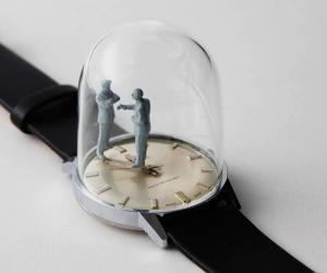 Dominic Wilcox's miniature watch sculpture sees a man disappointed every hour. 