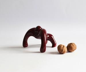 According to its creator NikyNaky, this ceramic Macaco paperweight just wants to be loved