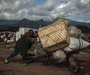 In eastern Congo, hand-hewn, low-tech scooters called chukudu's are a used to carry heaps of cargo, from food to fuel to bricks, across long distances. Image:mzaztiz.blogspot