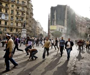 Guy Martin captured the turmoil surrounding the Egyptian protests of 2011. 