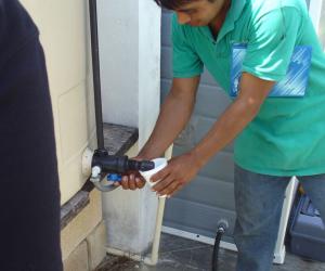 A villager uses MIT's solar powered system. Picture courtesy of MIT 