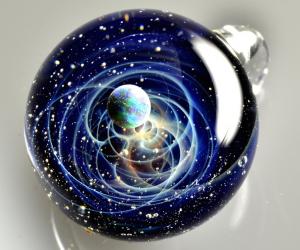 Satoshi Tamizu's work places tiny worlds into pendants.