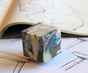 Industrial designer Carter Zufelt has developed a system that recycles plastic bags into objects that celebrate their origins