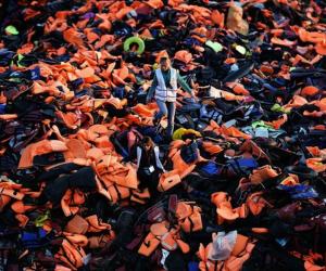 Volunteers on the Greek Island of Lesbos are taking the neon-orange lifejackets left by migrants and turning them into temporary mattresses