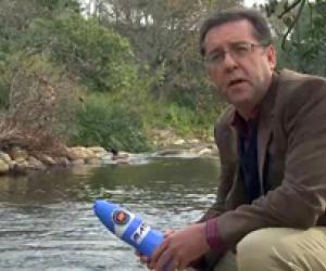 Professor Eugene Cloete with tea bag water filter. 