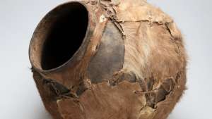 Water or beer African pot, covered with skin, from the Iziko Social History Collection.