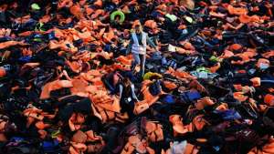 Volunteers on the Greek Island of Lesbos are taking the neon-orange lifejackets left by migrants and turning them into temporary mattresses