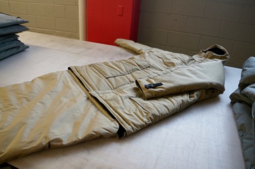 The EMPWR coat rolls out into a sleeping bag to keep homeless people ...