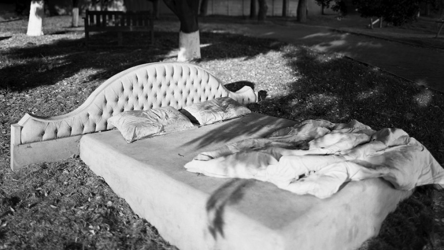 The Troyeville bedtime story, by Johannes Dreyer with Lesley Perkes and friends, Albertina Sisulu Road, Troyeville, Johannesburg. 8 April 2012. Image: David Goldblatt.