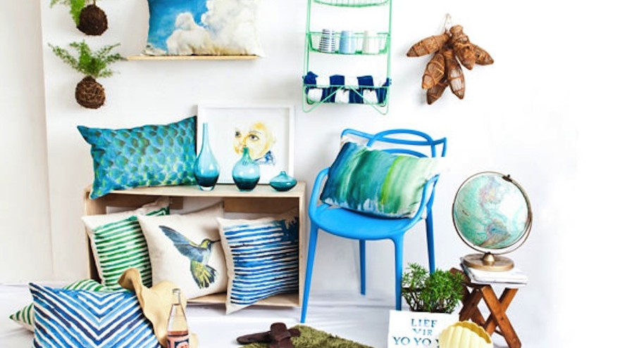 Local artist Euodia Roets hand paints her designs for her brand Touchee Feelee.