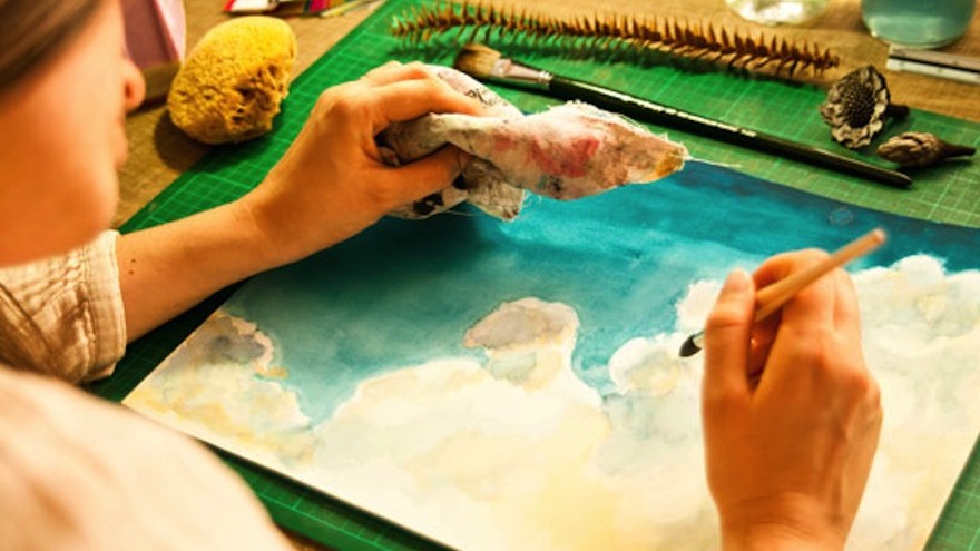 Local artist Euodia Roets hand paints her designs for her brand Touchee Feelee.