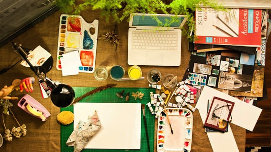 Local artist Euodia Roets hand paints her designs for her brand Touchee Feelee.