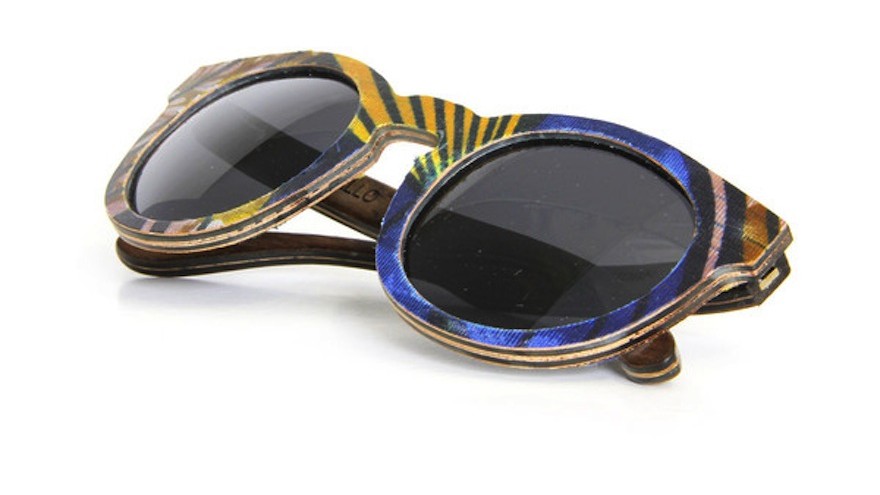 Ballo wooden eyewear is made locally from wood offcuts and recycled paper. This pair is covered with ShweShwe material.